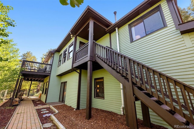 288 Spring Vly, Bailey, CO 80421 - back of house with a wooden deck