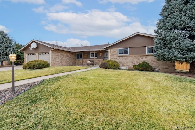 ranch-style house with a garage, brick siding, and a front lawn