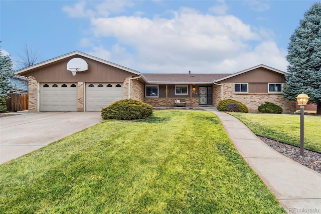 ranch-style home with brick siding, an attached garage, concrete driveway, and a front yard