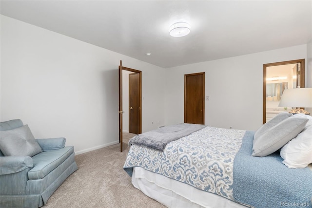 bedroom featuring baseboards and light carpet