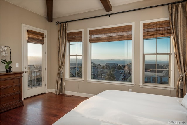 bedroom featuring beam ceiling, access to outside, baseboards, and dark wood-type flooring