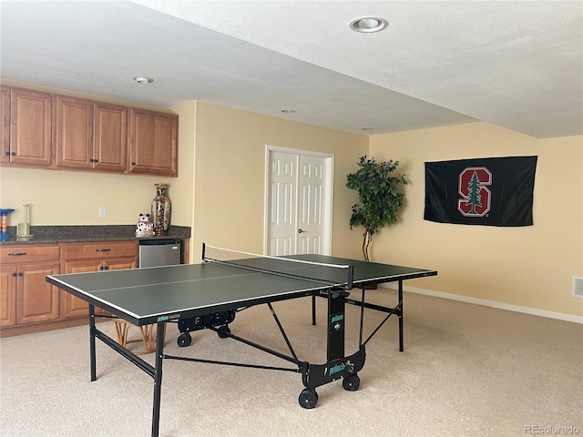6035 S Paris St, Englewood, CO 80111 - rec room featuring light colored carpet, bar, and recessed lighting