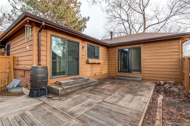 rear view of property with a deck