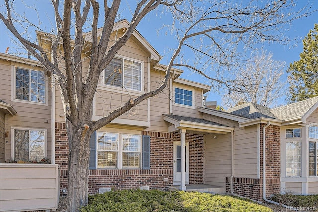 112 W Sterne Pkwy, Littleton, CO 80120 - view of front of property featuring brick siding