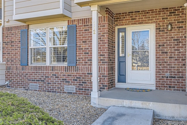 112 W Sterne Pkwy, Littleton, CO 80120 - doorway to property with brick siding and crawl space