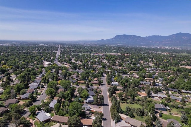 2615 Centre Ln, Colorado Springs, CO 80909 - aerial perspective of suburban area featuring a mountainous background