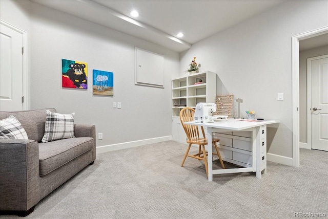 office space with baseboards, recessed lighting, and light colored carpet