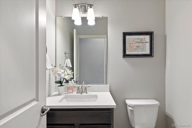 half bath with toilet and vanity