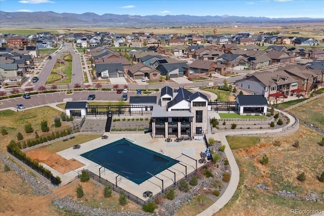 aerial view with a mountain view and a residential view