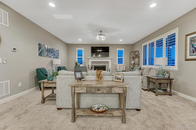 6470 Amur Ct, Castle Rock, CO 80108 - living room with light carpet, a fireplace, baseboards, and recessed lighting