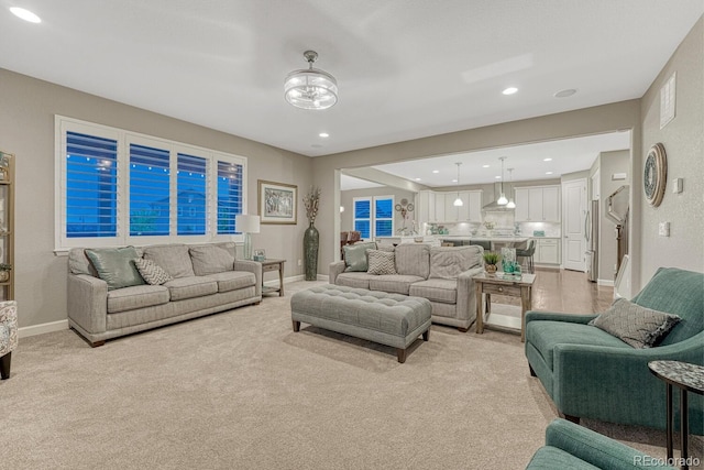 6470 Amur Ct, Castle Rock, CO 80108 - living room featuring light carpet, recessed lighting, and baseboards