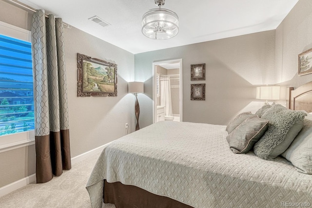 6470 Amur Ct, Castle Rock, CO 80108 - carpeted bedroom with baseboards, a chandelier, and connected bathroom