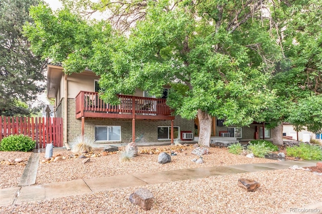 view of front of house with a wooden deck