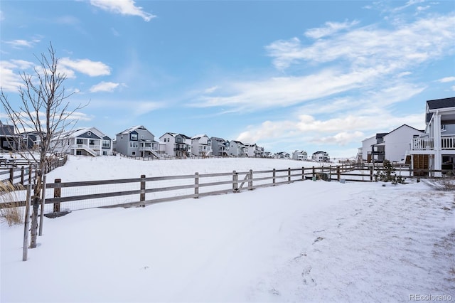 view of yard covered in snow