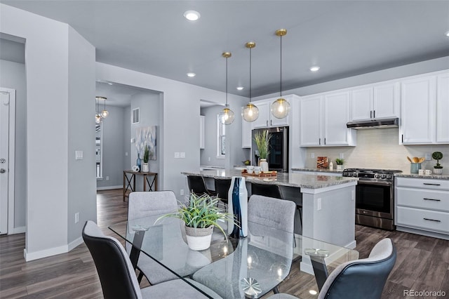 dining room featuring dark wood-type flooring