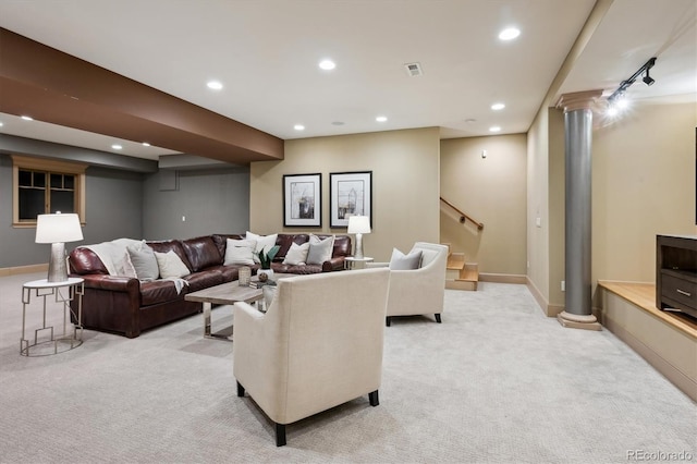 living room featuring light carpet, baseboards, visible vents, and recessed lighting