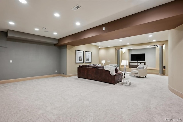 living room featuring recessed lighting, baseboards, visible vents, and light colored carpet