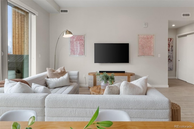 3233 Tejon St Unit 305, Denver, CO 80211 - living area featuring wood finished floors and recessed lighting