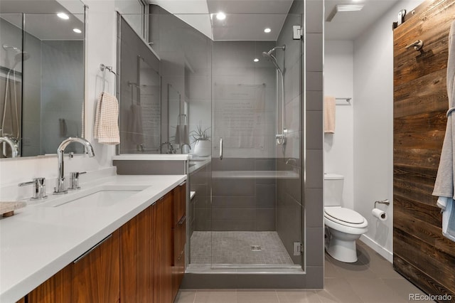 3233 Tejon St Unit 305, Denver, CO 80211 - bathroom with vanity, a shower stall, tile patterned floors, and recessed lighting