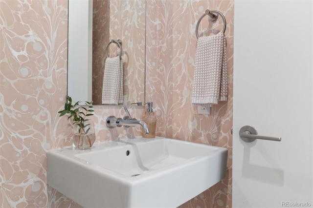 3233 Tejon St Unit 305, Denver, CO 80211 - bathroom with wallpapered walls and a sink