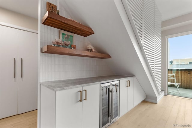 3233 Tejon St Unit 305, Denver, CO 80211 - indoor dry bar with beverage cooler and light wood-style floors