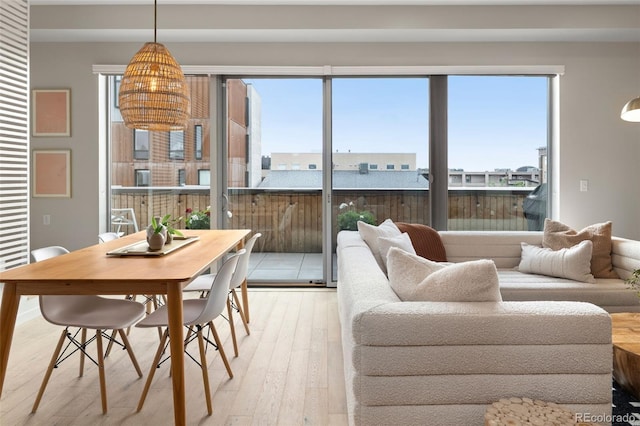 3233 Tejon St Unit 305, Denver, CO 80211 - living area with light wood-style floors and healthy amount of natural light