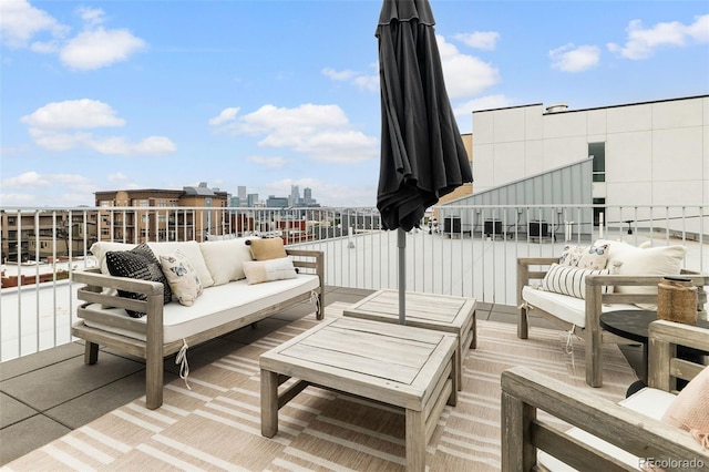 3233 Tejon St Unit 305, Denver, CO 80211 - wooden terrace featuring an outdoor hangout area and a city view