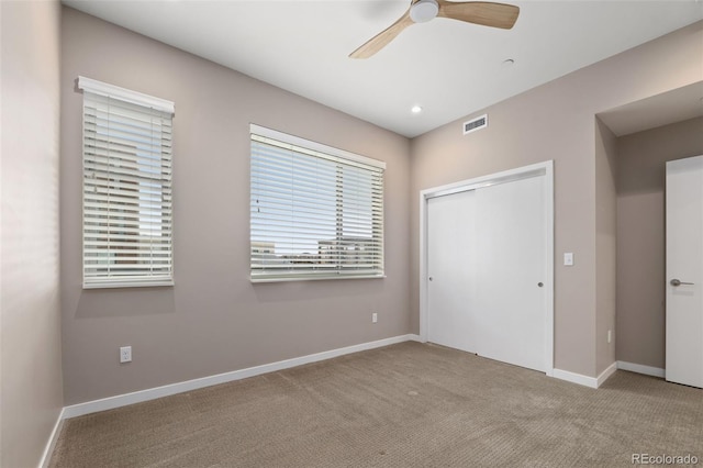 3233 Tejon St Unit 305, Denver, CO 80211 - unfurnished bedroom with carpet floors, a closet, a ceiling fan, and recessed lighting