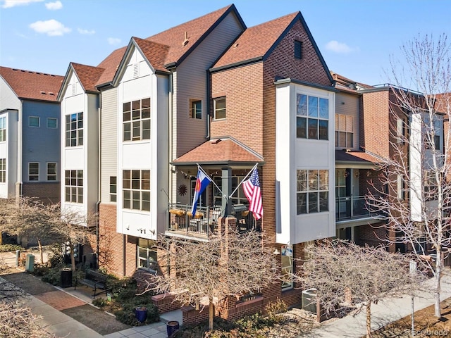 view of front of home with brick siding