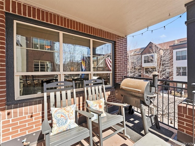 view of patio / terrace with a balcony