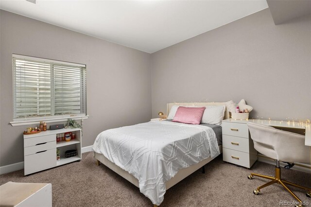 bedroom with light carpet