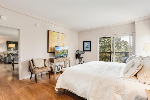 1133 Race St Unit 5A, Denver, CO 80206 - bedroom with crown molding, access to outside, and wood finished floors