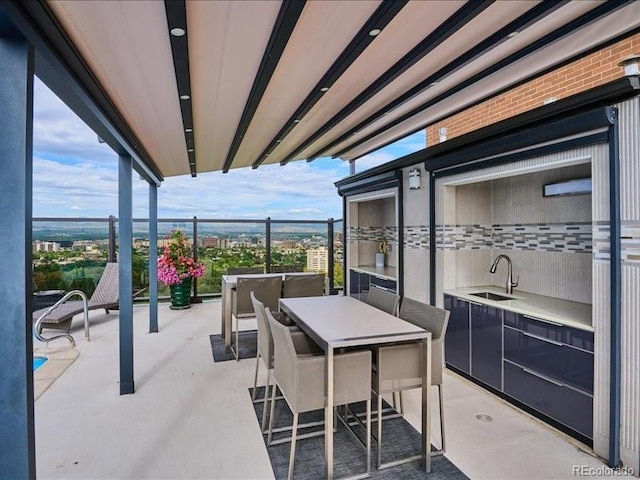 1133 Race St Unit 5A, Denver, CO 80206 - view of patio / terrace with outdoor dining area and a sink