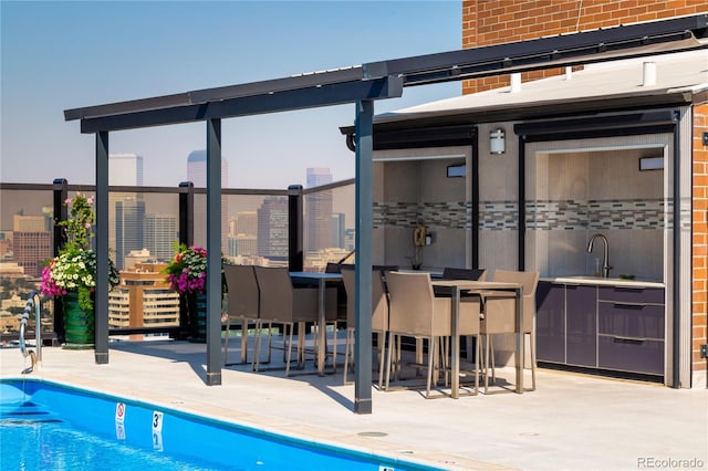 1133 Race St Unit 5A, Denver, CO 80206 - community pool with a patio