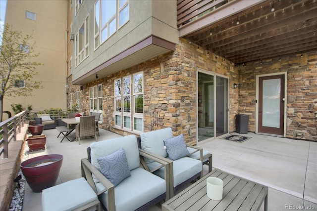 view of patio / terrace featuring an outdoor hangout area and outdoor dining space
