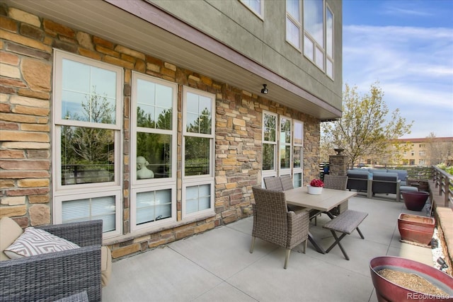 view of patio with outdoor dining space