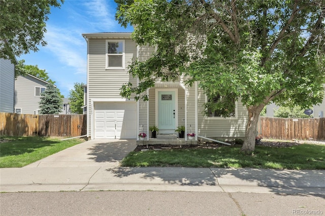 11757 W Tufts Pl, Morrison, CO 80465 - view of front of house featuring a garage and driveway