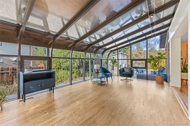 unfurnished sunroom with plenty of natural light