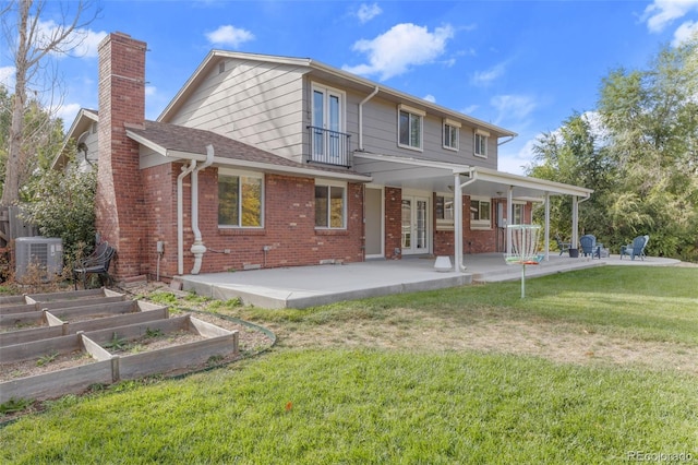 back of house with a yard, a patio, and cooling unit