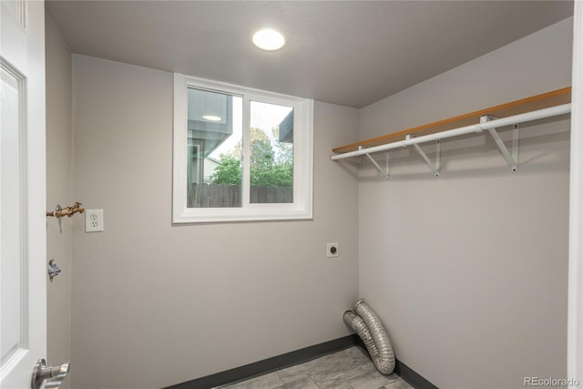 773 S Dearborn Cir, Aurora, CO 80012 - laundry area featuring electric dryer hookup and recessed lighting