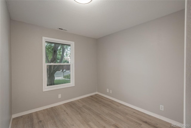 773 S Dearborn Cir, Aurora, CO 80012 - unfurnished room featuring wood finished floors
