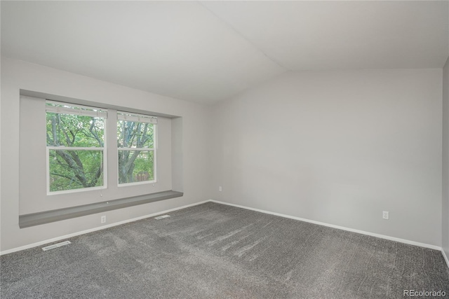773 S Dearborn Cir, Aurora, CO 80012 - carpeted empty room with baseboards and lofted ceiling