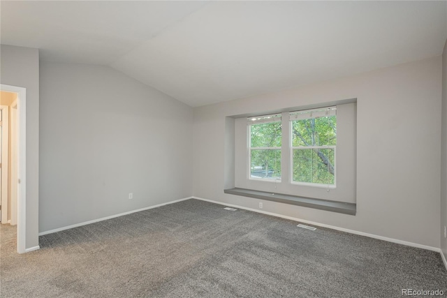 773 S Dearborn Cir, Aurora, CO 80012 - unfurnished bedroom featuring lofted ceiling and carpet