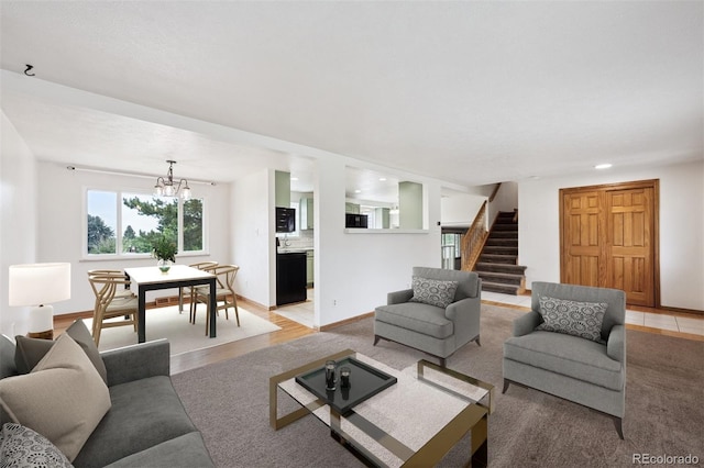 7323 Upham Ct, Arvada, CO 80003 - living area featuring stairs, a chandelier, and recessed lighting