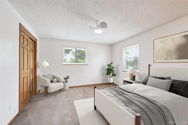 7323 Upham Ct, Arvada, CO 80003 - bedroom featuring multiple windows, carpet flooring, and a ceiling fan