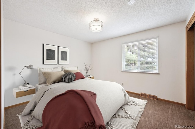 7323 Upham Ct, Arvada, CO 80003 - carpeted bedroom with baseboards and a textured ceiling