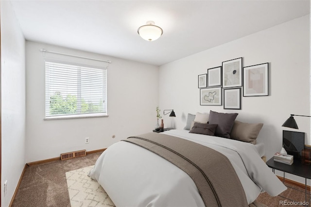 7323 Upham Ct, Arvada, CO 80003 - carpeted bedroom with baseboards