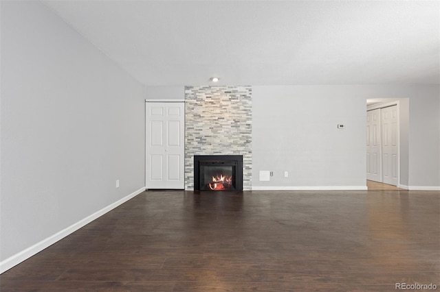2366 S Troy St, Aurora, CO 80014 - unfurnished living room featuring a fireplace and wood finished floors