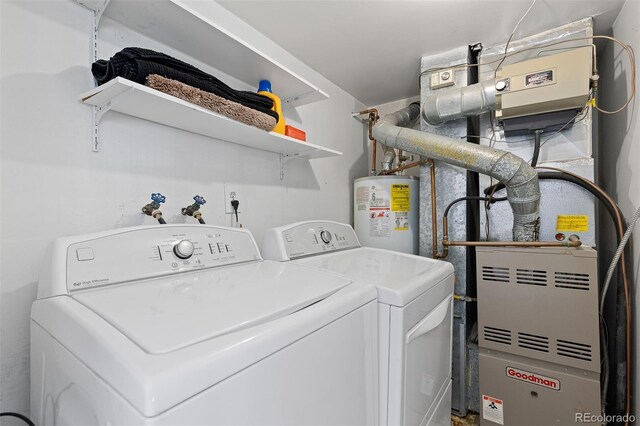 2366 S Troy St, Aurora, CO 80014 - washroom with water heater and separate washer and dryer