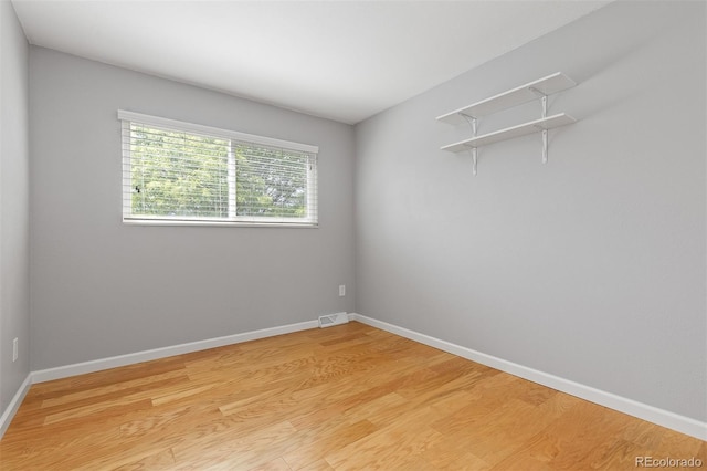 2366 S Troy St, Aurora, CO 80014 - unfurnished room with light wood-style flooring and baseboards